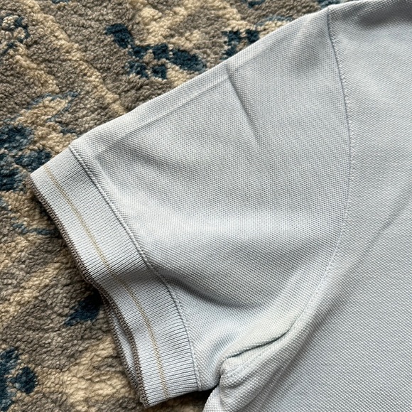 Prada Polo Shirt in Light Blue with Prada Stitched on bottom - Picture 3 of 10